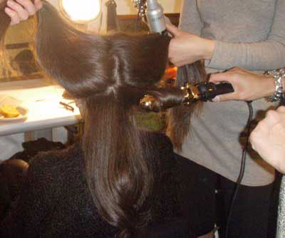 cutler-stylists-curling-hair-backstage-at-rebecca-taylor-fall-2010