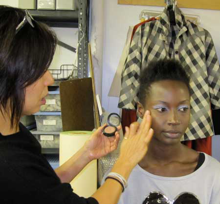 applying-cheek-color-backstage-at-yeohlee-fw11