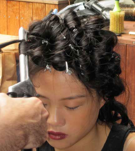 curling-hair-backstage-at-hyden-yoo-ss12