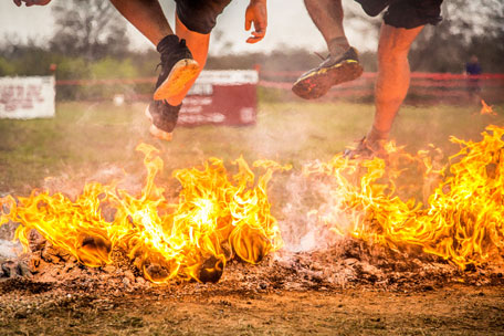 austin-warrior-dash-2017-jumping-over-fire